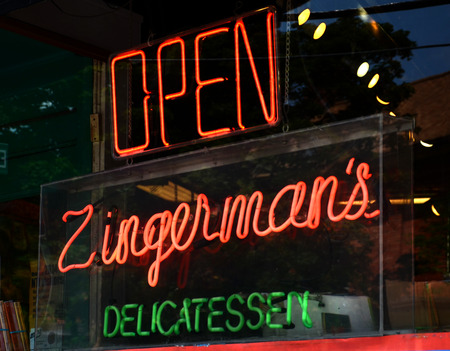 ANN ARBOR, MI - AUGUST 3: Neon sign in Zingerman's deli window in Ann Arbor, MI on August 3, 2014.  Zingerman's co-owner Paul Saginaw has lobbied to increase the minimum wage.のeditorial素材