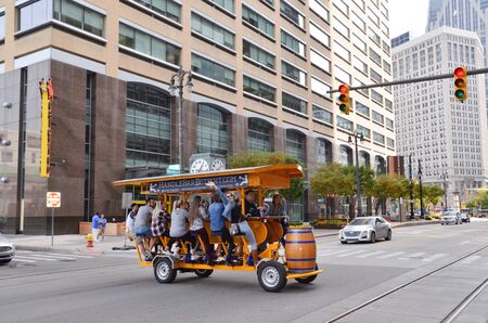 DETROIT, MI / USA - OCTOBER 21, 2017:  Visitors take a ride on the Handle Bar as it crosses Woodward Avenue in downtown Detroit.のeditorial素材