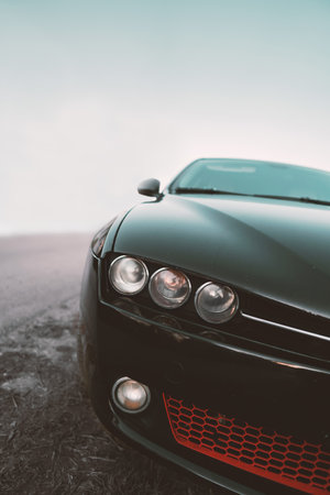 Close up Black Car Lamps with Foggy weather, Streetの写真素材