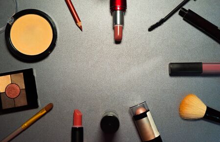 Cosmetics on grey background, closeupの写真素材