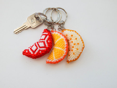 Bright key chains on a white. A lot of colorful key chains on a white background