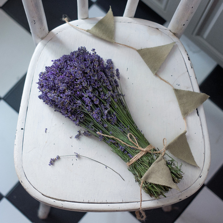 bouquet of lavender on vintage wood with old blank tag giftの写真素材