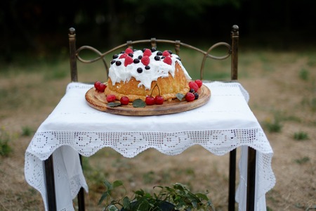 Strawberry cake Frazier on a wooden background with mint leavesの写真素材