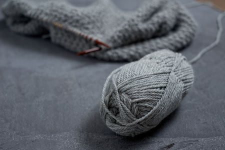 Close-up of hands knitting. Process of knitting.の写真素材
