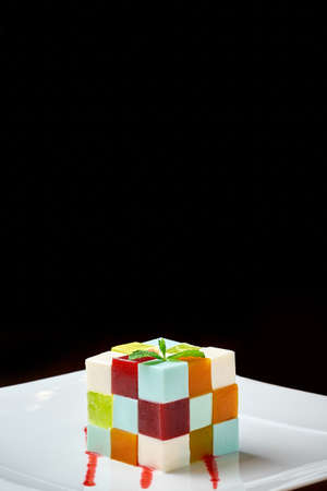 Jelly dessert colored yummy isolated black backgroundの写真素材