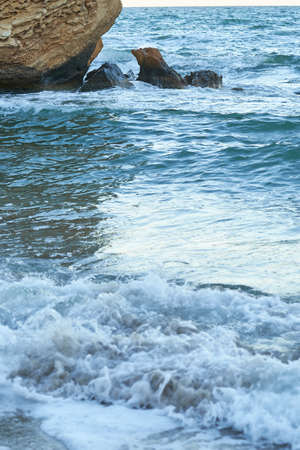 Sunset on the beach summertime blue stonesの写真素材