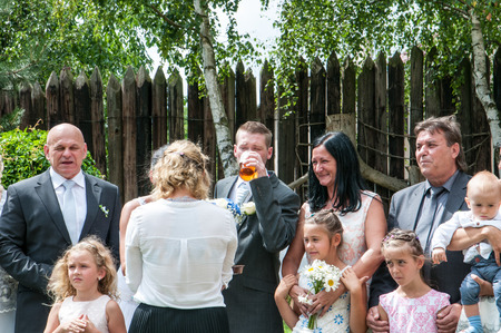 Prague, Czech Republic, July 29, 2017, the bride groom and guests at a rural wedding dayのeditorial素材