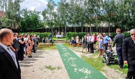 Prague, Czech Republic, July 29, 2017, the bride groom and guests at a rural wedding dayのeditorial素材