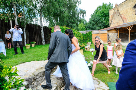 Prague, Czech Republic, July 29, 2017, the bride groom and guests at a rural wedding dayのeditorial素材