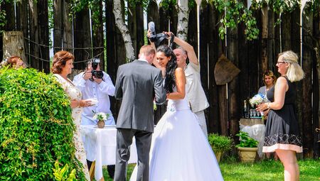 Prague, Czech Republic, July 29, 2017, the bride groom and guests at a rural wedding dayのeditorial素材