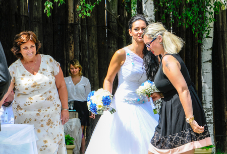 Prague, Czech Republic, July 29, 2017, the bride groom and guests at a rural wedding dayのeditorial素材