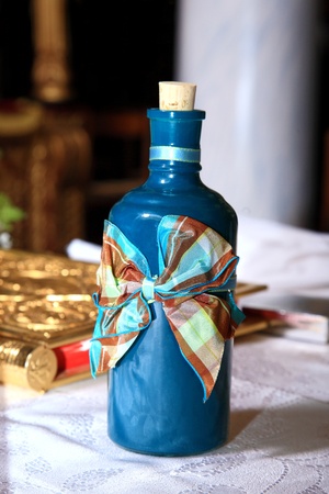 boottle with oil for christening on a churchの写真素材