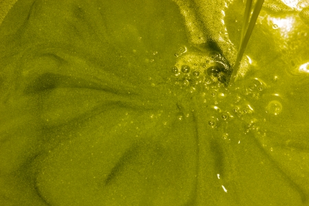 Olive oil poor fall out an modern oil millの写真素材