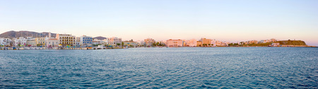 panoramic view of Tinos island town by the port ,Greeceの写真素材