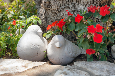 part of the exterior of a traditional house with flowers and decorationの写真素材