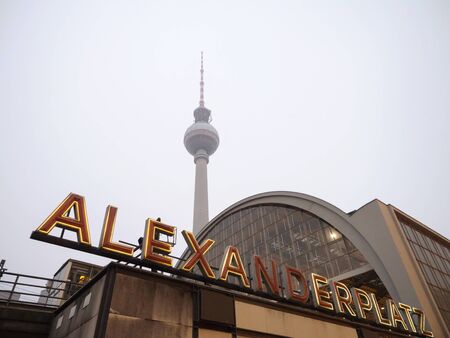 BERLIN, GERMANY - JANUARY 5 2016: The lettering Alexanderplatz and the television tower at the station Alexanderplatz in Berlinのeditorial素材