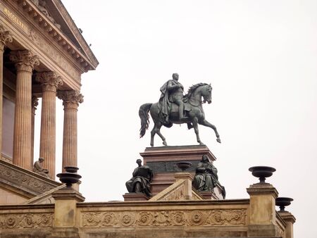 BERLIN, GERMANY - JANUARY 5, 2016: Statue in front of the Alte National galerie museum in Berlin Germanyのeditorial素材