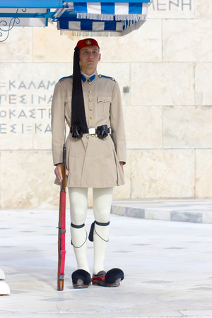 ATHENS,GREECE - MAY 11,2016:The Greek Presidential guard called Tsolias dressed in traditional uniform at the monument in front of the Greek parliamentのeditorial素材
