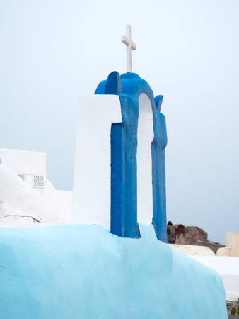 Traditional roof top of small church in Santorini, Greeceの写真素材