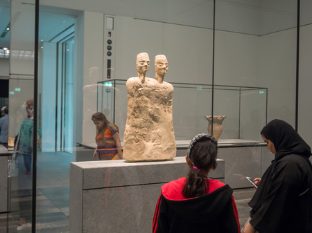 Abu Dhabi, United Arab Emirates -  December 20, 2017: People looking at exhibits in the new  Louvre Museum in Abu Dhabiのeditorial素材