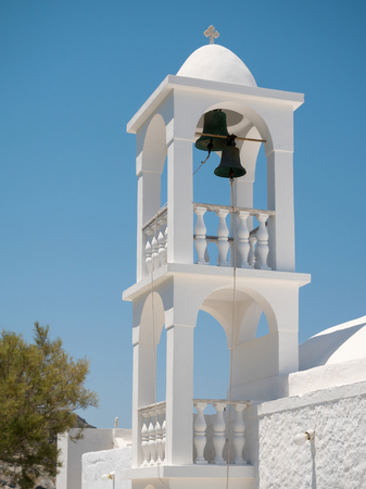Traditional bell tower of a church in Milos island, Greeceの写真素材