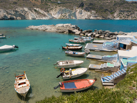 MILOS, GREECE - JULY 13,2017:Small fishing boats in the port of Mandrakia village in Milos island, Greeceのeditorial素材