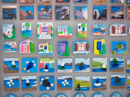 MILOS,CYCLADES / GREECE, Close up of fridge magnet souvenirs from Milos island, Greeceの写真素材