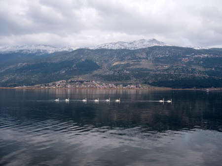 The lake of Ioannina city in Nothern Greece, in the afternoon with clouds
