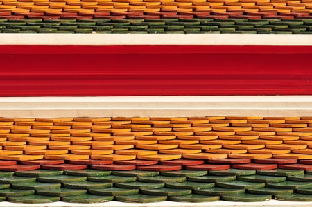 Architectural Detail of Temple Roof Tiles in Thailandの写真素材