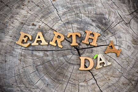 Earth day word on wood background for save the earth campaignの写真素材