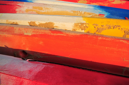 Close-up colourful side view of kayak boat with sand, abstract concept and textured ideaの写真素材