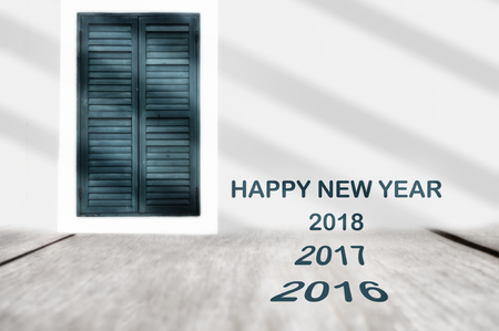 Happy new year 2018 on plank and classic window background, happy summer holiday concept and retro...