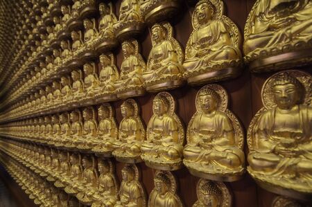 Pattern of golden Chinese Buddha at Wat Leng Nei Yi 2 or Borom Raja Kanchanapisek Anusorn temple in...