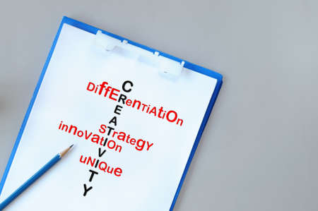 Creativity tools on notepad with pencil on grey background, business success concept and education...