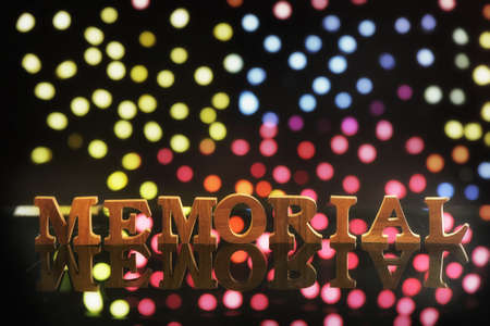 Memorial day words on colorful bokeh background, holiday and event conceptの写真素材