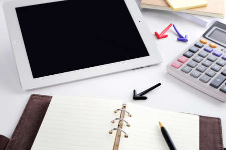 Top view of busy working desk, business and finance concept, input text ideaの写真素材