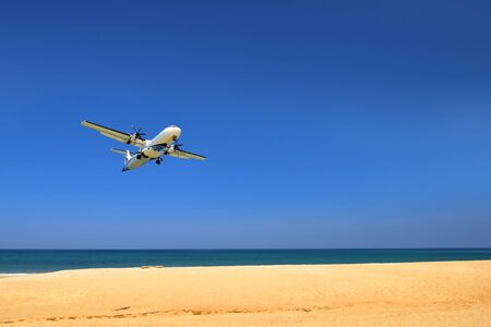 PHUKET, THAILAND - MARCH 26, 2018:  Asia Boutique Airline landing on blue sky at Phuket International Airportのeditorial素材