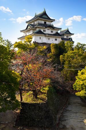 WAKAYAMA JAPAN - November 2019: Wakayama castle on blue sky background. Fall colour conceptのeditorial素材
