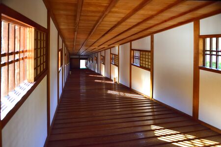 WAKAYAMA JAPAN - November 2019: Ohashi Roka wooden bridge is a located right near Momijidani garden in Wakayama castle, Japan.Ohashi Roka was constructed in the Edo Periodのeditorial素材