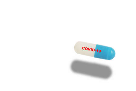 Coronavirus covid-19 drug capsule isolated on white background, selective focus and copy space idea