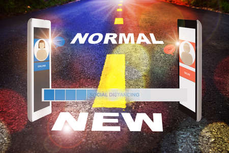 Mobile chat and new normal word on road. Social distancing and working from home concept and new normal life after covid-19 ideaの写真素材