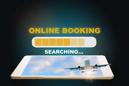 Online travel booking loading on computer digital tablet on abstract background. Time to travel concept and business recovery ideaの写真素材