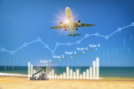 Commercial plane ready for landing or taking off with growth graph and year 2022 to 2026. Airplane business recovery after covid-19 impact to airplane transport industry crisis conceptの写真素材