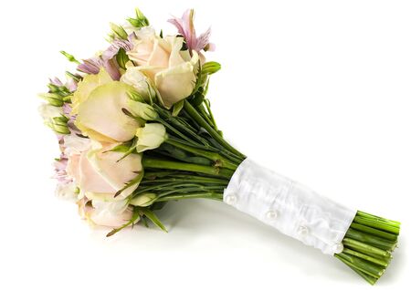 Bridal bouquet of roses and alstroemeria isolated on whiteの写真素材