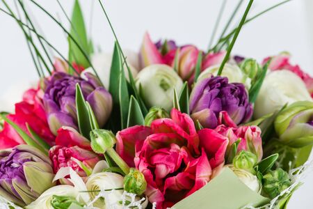 close-up of beautiful delicate bouquet with peony, tulip, buttercupの写真素材