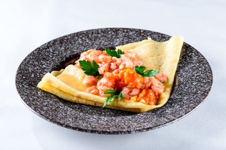 Delicious pancake blini with shrimpsの写真素材