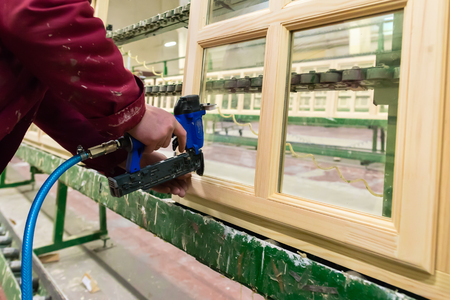 Manual worker doing his job at the woodworking factory. Environmの写真素材