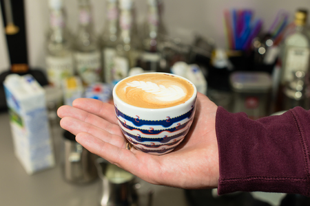 selective focus on a cup of cappuccinoの写真素材