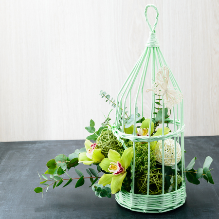decorative cage with flowersの写真素材