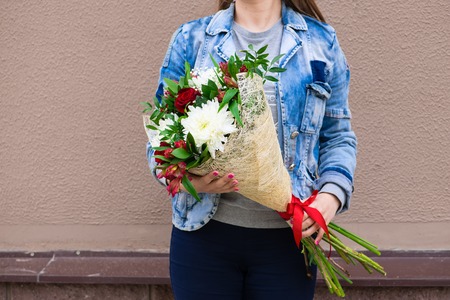 woman with bouquet of flowersの写真素材